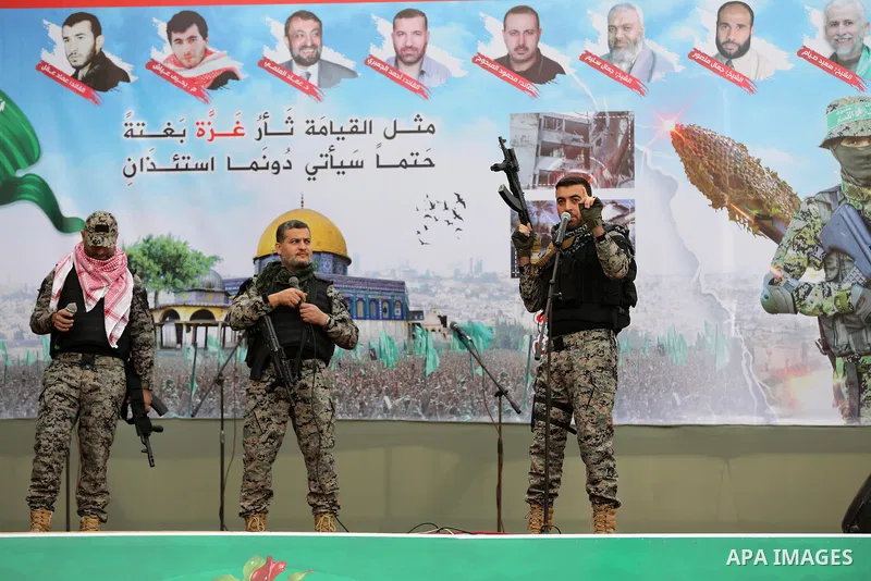 Palestinian Hamas supporters gather to attend a Hamas rally marking the 32th anniversary of the Islamist movement's founding In Jabalia, northern Gaza Strip, on December 13, 2019. Photo by Mahmoud Nasser