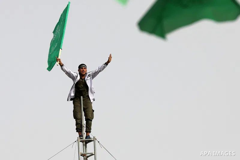 Palestinian Hamas supporters gather to attend a Hamas rally marking the 32th anniversary of the Islamist movement's founding In Jabalia, northern Gaza Strip, on December 13, 2019. Photo by Mahmoud Nasser