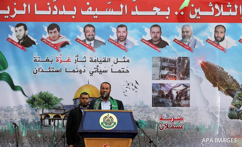 Palestinian Hamas supporters gather to attend a Hamas rally marking the 32th anniversary of the Islamist movement's founding In Jabalia, northern Gaza Strip, on December 13, 2019. Photo by Mahmoud Nasser