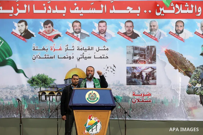 Palestinian Hamas supporters gather to attend a Hamas rally marking the 32th anniversary of the Islamist movement's founding In Jabalia, northern Gaza Strip, on December 13, 2019. Photo by Mahmoud Nasser
