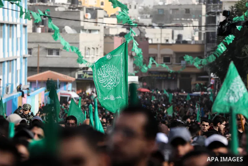 Palestinian Hamas supporters gather to attend a Hamas rally marking the 32th anniversary of the Islamist movement's founding In Jabalia, northern Gaza Strip, on December 13, 2019. Photo by Mahmoud Nasser