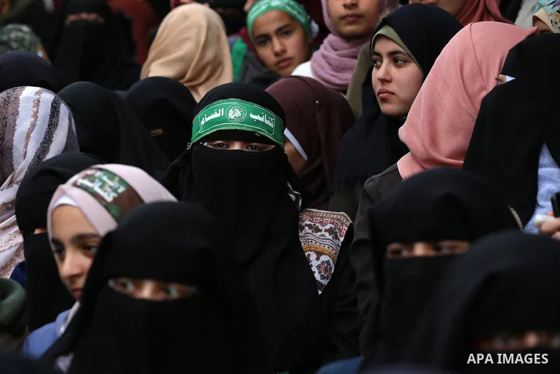 Palestinian women takes part in a marking the 32th anniversary of the Islamist movement's founding in Khan Younis in the southern of Gaza strip, on December 13, 2019. Photo by Ashraf Amra