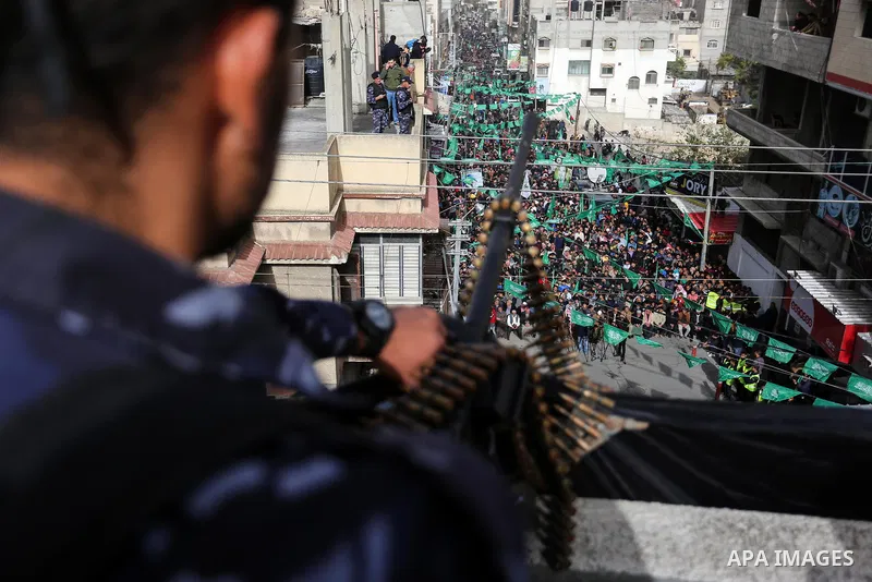 Palestinian policemen stand guard marking the 32th anniversary of the Islamic movement's founding in Khan Younis in the southern of Gaza strip, on December 13, 2019. Photo by Ashraf Amra