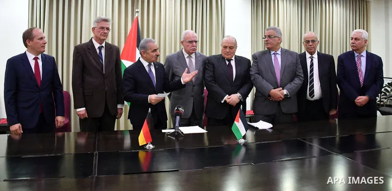 Palestinian Prime Minister Mohammad Ishtayeh, attends signing agreements with the Republic of Germany, in the West Bank city of Ramallah, on December 17, 2019. Photo by Prime Minister Office