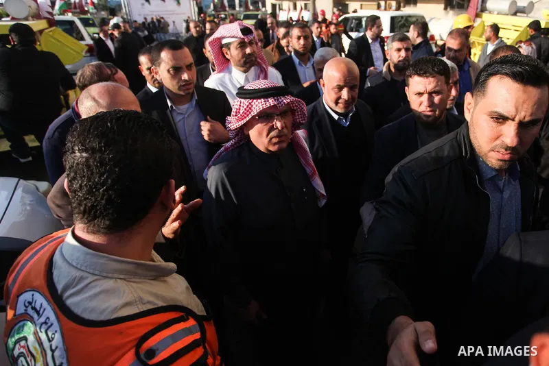 Qatar's Ambassador to the Palestinian Authority, Mohammed Al Emadi attends a ceremony to delivery vehicles and equipments with a donation from the State of Qatar for the benefit of the Palestinian Fire and Civil Defense...