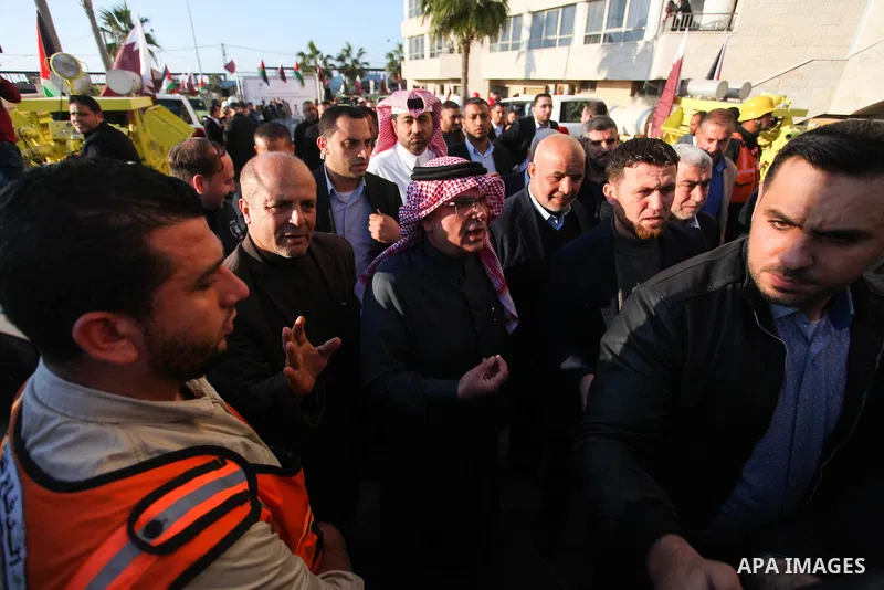 Qatar's Ambassador to the Palestinian Authority, Mohammed Al Emadi attends a ceremony to delivery vehicles and equipments with a donation from the State of Qatar for the benefit of the Palestinian Fire and Civil Defense...