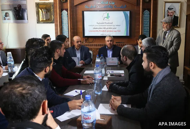 Palestinians attend a meeting in Gaza City, on December 19, 2019. Photo by Ashraf Amra
