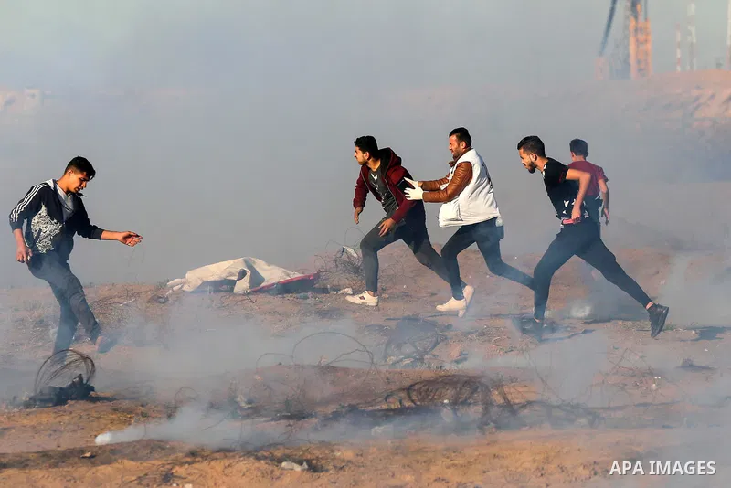 A wounded Palestinian protester is evacuated during clashes with Israeli troops following the tents protest where Palestinians demand the right to return to their homeland at the Israel-Gaza border, in Khan Younis in the...