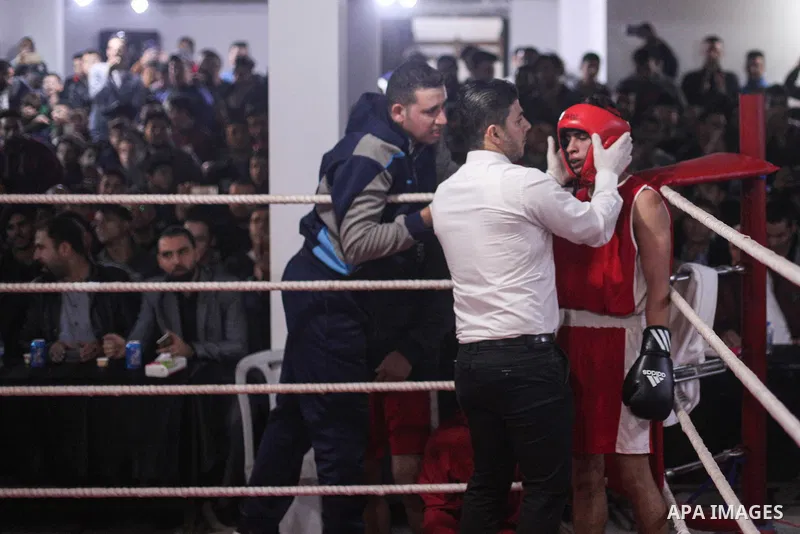 Palestinian fighters _men and youth categories _ compete during the " Palestine Boxing Championship ", in Gaza city, on December 20, 2019. Photo by Mahmoud Ajjour