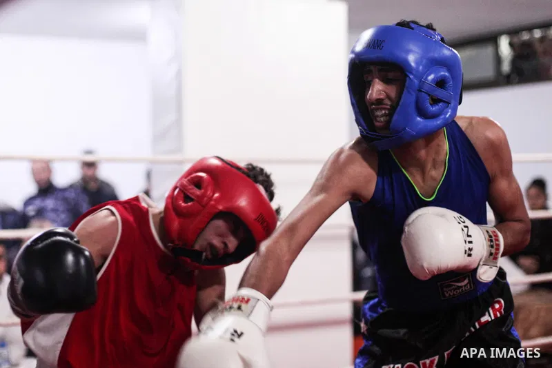 Palestinian fighters _men and youth categories _ compete during the " Palestine Boxing Championship ", in Gaza city, on December 20, 2019. Photo by Mahmoud Ajjour