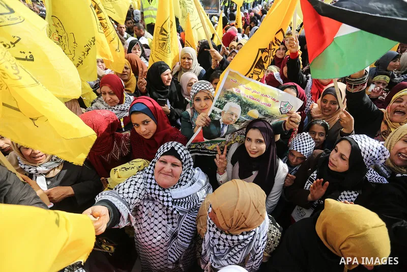 Palestinian supporters of the Fatah movement take part during a rally in Gaza City on January 01, 2020, marking the 55th anniversary of the creation of the political party. Photo by Ashraf Amra