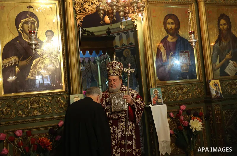 Greek Orthodox Archbishop Alexios holds an Orthodox Christmas mass at the Saint Porfirios church in Gaza City on January 7, 2020. The Orthodox Church celebrates Christmas and other religious holidays according to the Jul...