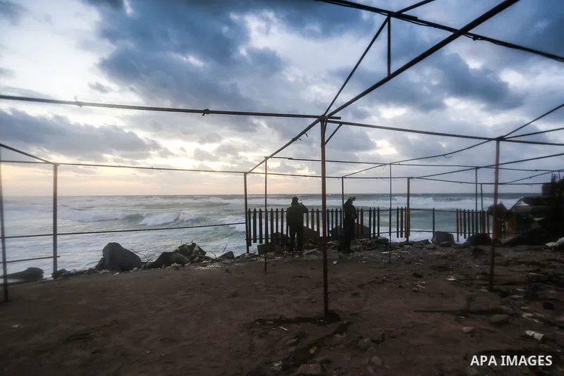 Palestinians enjoy at the sea port, during a storm day in Gaza City, on January 08, 2020. Photo by Ashraf Amra