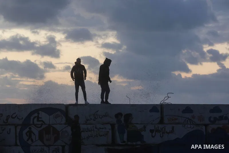 Palestinians enjoy at the sea port, during a storm day in Gaza City, on January 08, 2020. Photo by Ashraf Amra