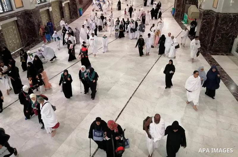 Muslim pilgrims walk in the Al-Safa direction (Safa and Marwah) where Muslims walk back and forth seven times during the Umrah pilgrimage rite at the grand Mosque in the holy city of Mecca , Saudi Arabia, on January 22,...
