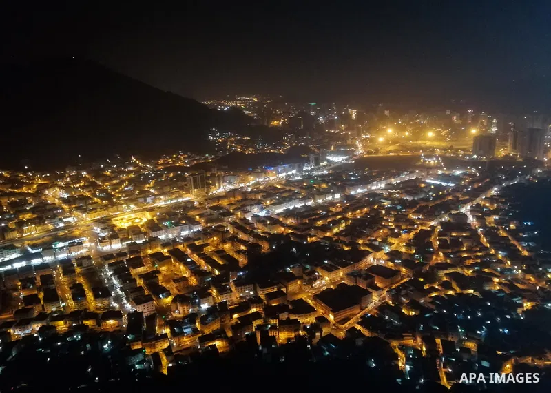 Muslim pilgrims pray at Mount Al-Noor during the Umrah pilgrimage rite in the holy city of Mecca, Saudi Arabia, on January 24, 2020. Mount Al-Noor houses Ghar-E-Hira or Hira cave, where Prophet Mohammad is said to have s...