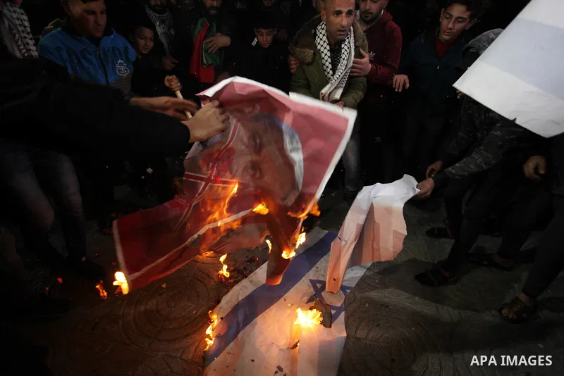 Palestinian demonstrators burn tyres during a protest against US President Donald Trump's expected peace plan proposal, in Gaza city on January 28, 2020. Donald Trump has launched his “ultimate deal” for Middle East peac...