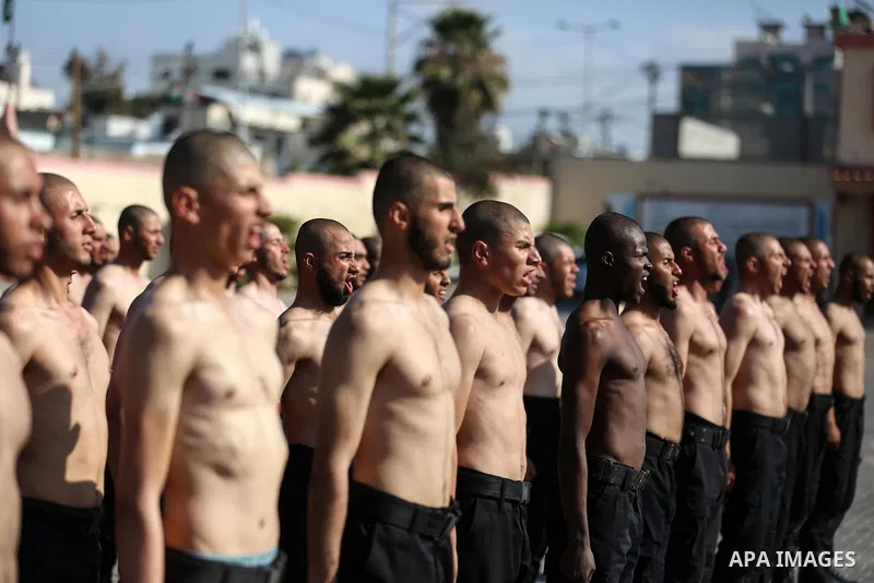 Palestinian students show off their military skills during a c at a police academy, in Gaza City January 30, 2020. Photo by Ashraf Amra