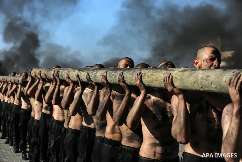 Palestinian students show off their military skills during a c at a police academy, in Gaza City January 30, 2020. Photo by Ashraf Amra