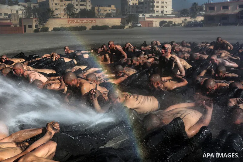 Palestinian students show off their military skills during a c at a police academy, in Gaza City January 30, 2020. Photo by Ashraf Amra
