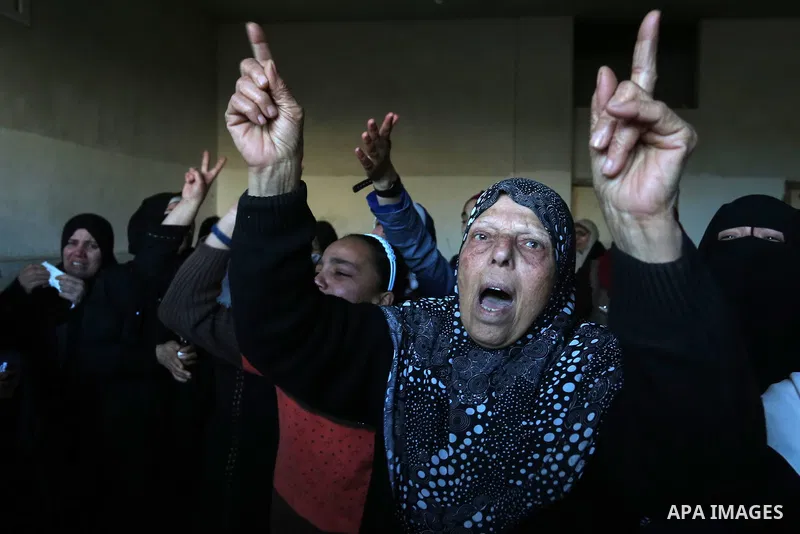 Relatives of Palestinian Alaa Al-Abbasi, who was died of a wound sustained months ago during a protest at the Israel-Gaza border, react during his funeral in Khan Yunis in the southern of Gaza Strip on January 31, 2020....