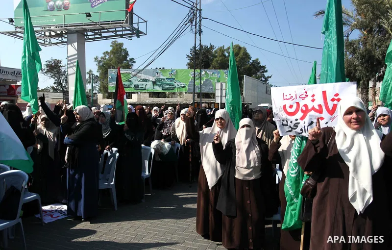 Palestinian women supporter Hamas movement take part in a protest against US President Donald Trump's Century Deal "expected peace plan" in Gaza city on February 5, 2020. Photo by Mahmoud Ajjour