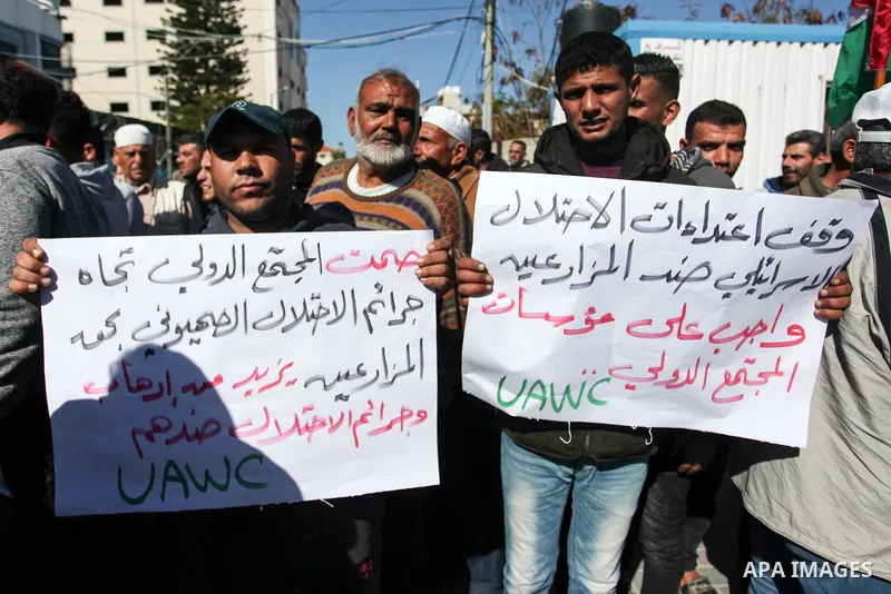 Palestinian farmers take part in a protest against the spraying pesticides on agricultural crops by Israeli air, in Gaza City on February 6, 2020. Photo by Mahmoud Ajjour