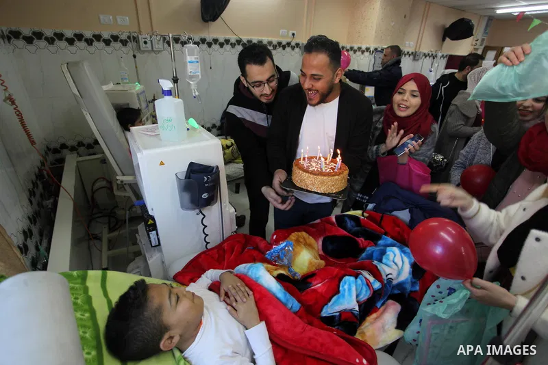 Palestinians from the "Ehsan" campaign team visit kidney patients at el-Rantisi hospital in Gaza city, on February 15, 2020. The Al-Ihsan campaign is a voluntary campaign, launched in 2011. Photo by Mahmoud Ajjour