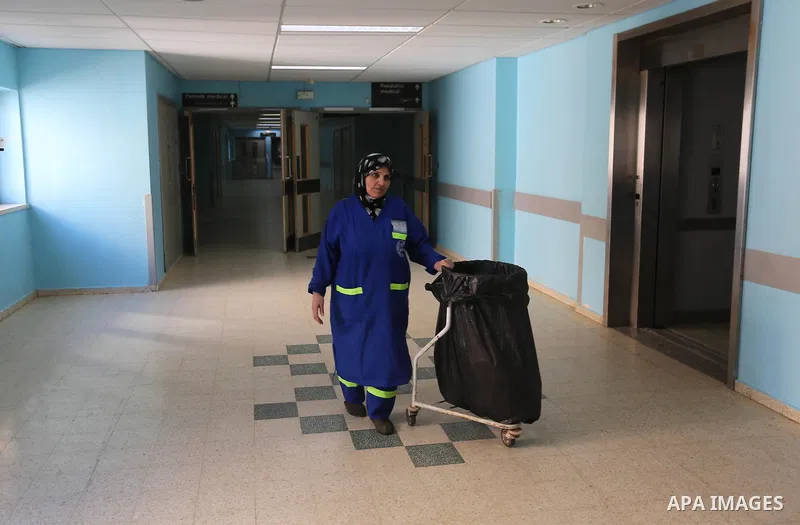 Palestinian cleaner Shafa Abu Musa, 55, works in a cleaning company in Khan Yunis in the southern Gaza Strip on March 8, 2020. International Women's Day (IWD) is celebrated on the 8th of March every year around the world...