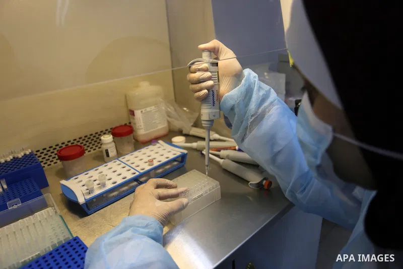 Palestinian Laboratory Medicine Specialist, tests vials of samples for coronavirus at Medical Laboratory, in Gaza city on March 15, 2020. For most people, the new coronavirus causes only mild or moderate symptoms. For so...