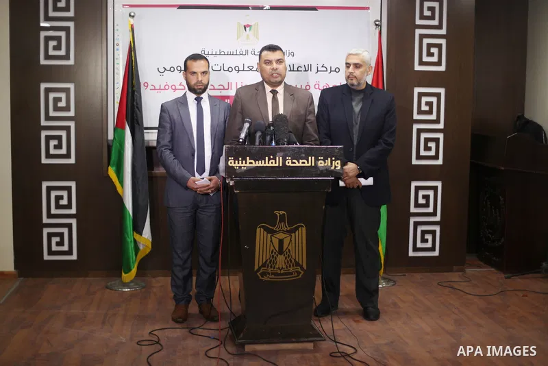 Palestinians from the Ministry of Health, Interior and Information attend a press conference about the coronavirus, in Gaza city, on March 17, 2020. Photo by Mahmoud Ajjour
