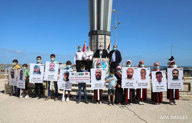 Palestinians take part during a rally to mark the 10th anniversary of the Mavi Marmara Gaza flotilla incident, at the seaport of Gaza City May 31, 2020. Nine activists, eight Turkish and one Turkish-American, died on May...