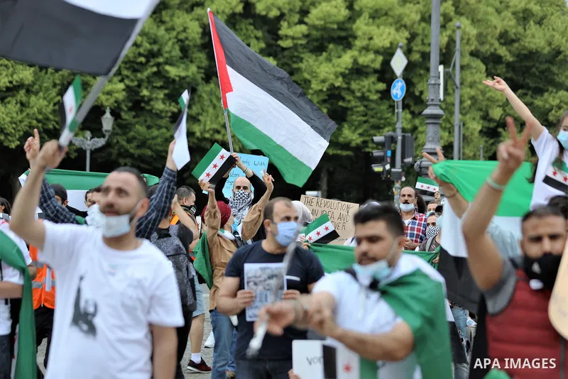 Syrian refugees protest in front of the US embassy against the sanctions imposed on their country and against the Kaiser Law in Berlin, Germany on June 19, 2020. Photo by Manar Shahin