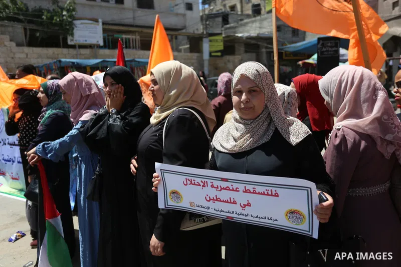Palestinian protesters demonstrate against Israel's plans to annex parts of the occupied West Bank, in Khan Younis in the southern of Gaza strip on June 23, 2020. Photo by Ashraf Amra