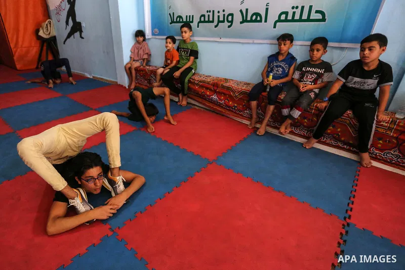 Palestinian boys perform yoga on International Yoga Day amid the coronavirus disease (COVID-19) crisis in a club in Gaza City June 25, 2020. Photo by Ashraf Amra