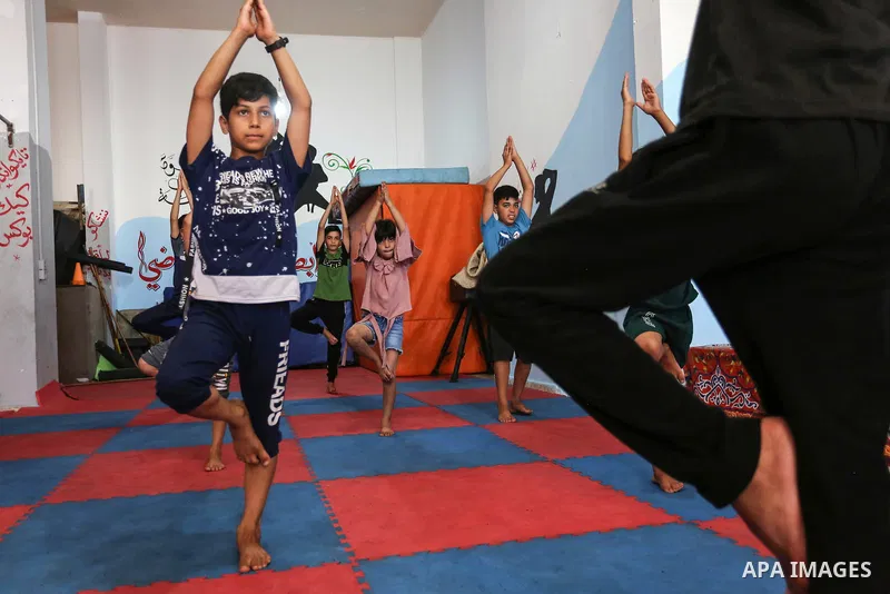 Palestinian boys perform yoga on International Yoga Day amid the coronavirus disease (COVID-19) crisis in a club in Gaza City June 25, 2020. Photo by Ashraf Amra