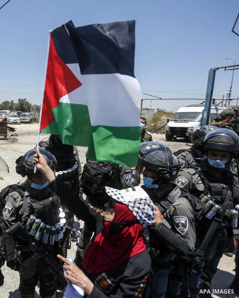 Palestinians argue with Israeli security forces during a protest against Israel's plan to annex parts of the occupied West Bank, in the Palestinian village of Haris, southwest of Nablus, on June 26, 2020. Photo by Shadi...