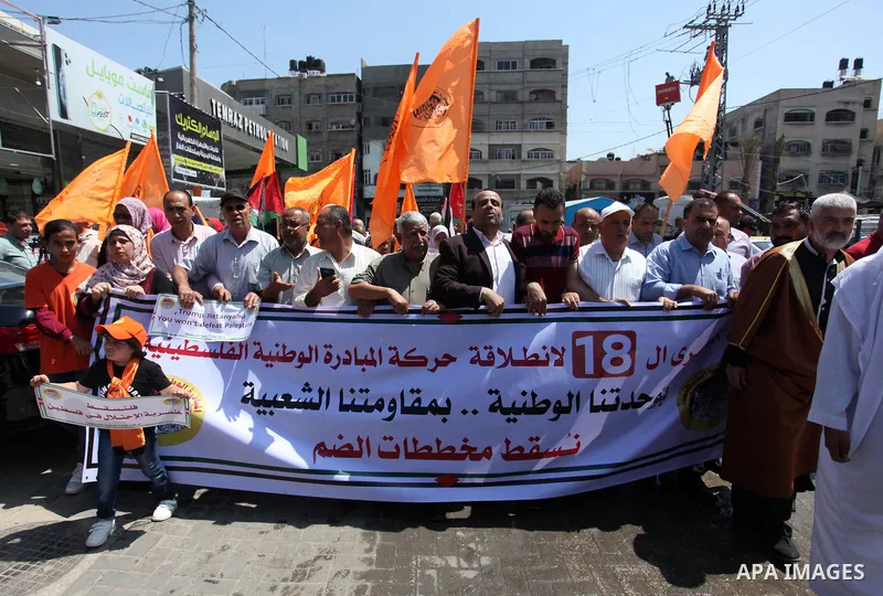palestinians take part in a protest against Israel's plan to annex parts of the occupied territory and against US President Donald Trump's Century Deal "expected peace plan", in Jabalia northern Gaza Strip, on June 27, 2...