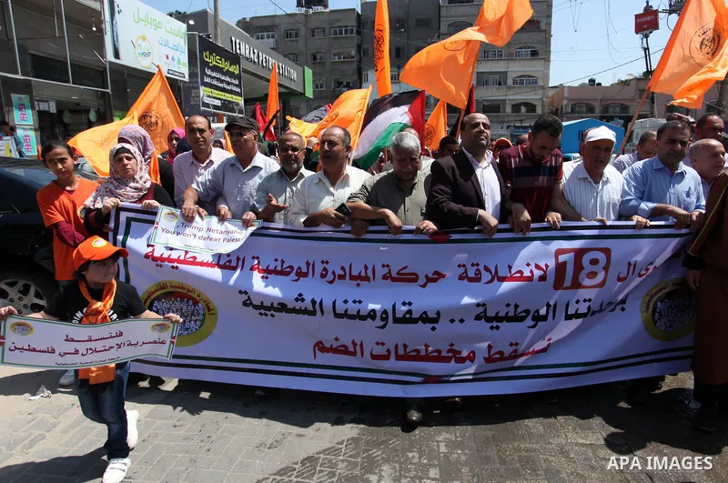 palestinians take part in a protest against Israel's plan to annex parts of the occupied territory and against US President Donald Trump's Century Deal "expected peace plan", in Jabalia northern Gaza Strip, on June 27, 2...