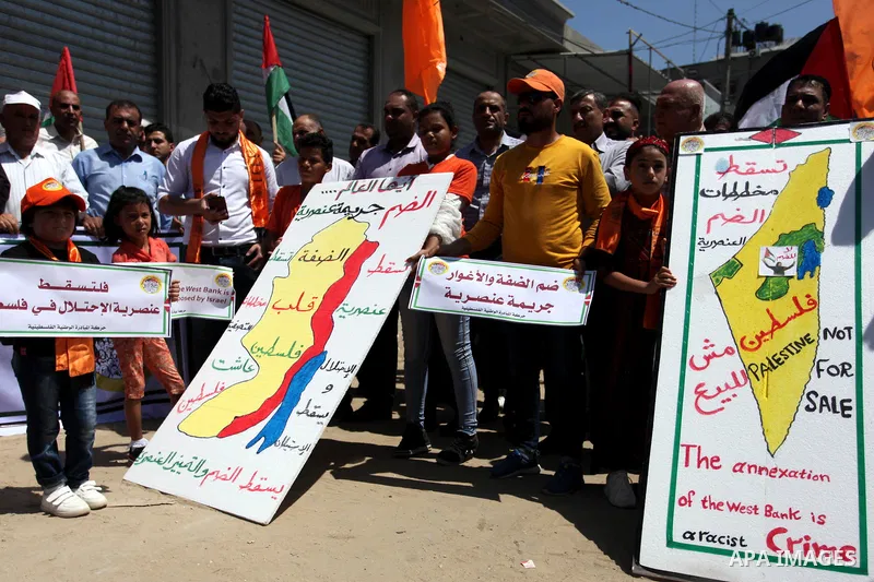palestinians take part in a protest against Israel's plan to annex parts of the occupied territory and against US President Donald Trump's Century Deal "expected peace plan", in Jabalia northern Gaza Strip, on June 27, 2...