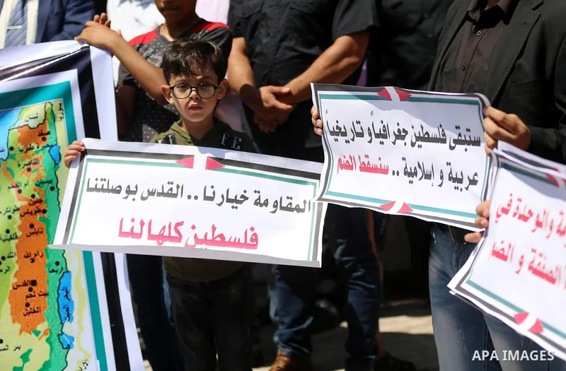 palestinians take part in a protest against Israel's plan to annex parts of the occupied territory and against US President Donald Trump's Century Deal "expected peace plan", in Gaza city on June 27, 2020. Israel intends...