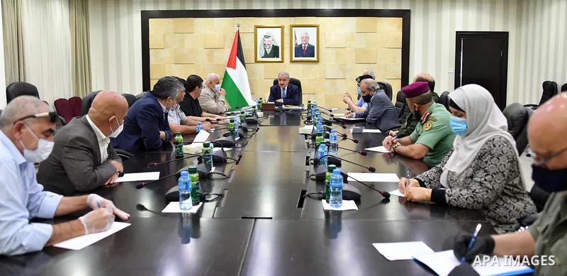 Palestinian Prime Minister Mohammed Ishtayeh chairs a meeting of the leaders of the security establishment, in the West Bank city of Ramallah, on June 27, 2020 Photo by Prime Minister Office