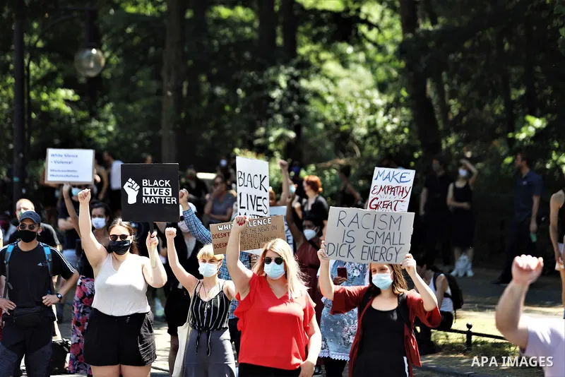 People gather take part in a protest against racial inequality, in Berlin, Germany, on June 27, 2020. Photo by Manar Shahin