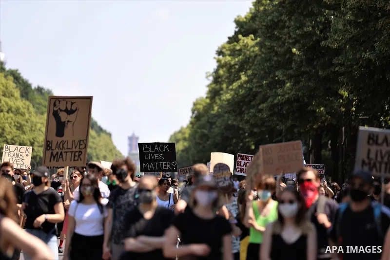 People gather take part in a protest against racial inequality, in Berlin, Germany, on June 27, 2020. Photo by Manar Shahin