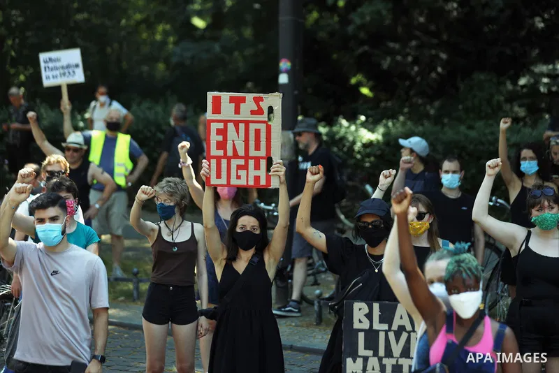 People gather take part in a protest against racial inequality, in Berlin, Germany, on June 27, 2020. Photo by Manar Shahin