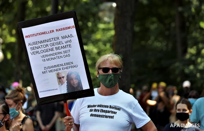 People gather take part in a protest against racial inequality, in Berlin, Germany, on June 27, 2020. Photo by Manar Shahin