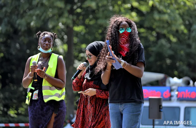 People gather take part in a protest against racial inequality, in Berlin, Germany, on June 27, 2020. Photo by Manar Shahin
