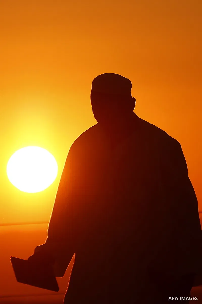 Samaritans gather to pray on top of Mount Gerizim near the northern West Bank city of Nablus as they celebrate the Shavuot festival at dawn, on June 28, 2020. Shavuot marks the giving of the Torah at Mount Sinai seven we...