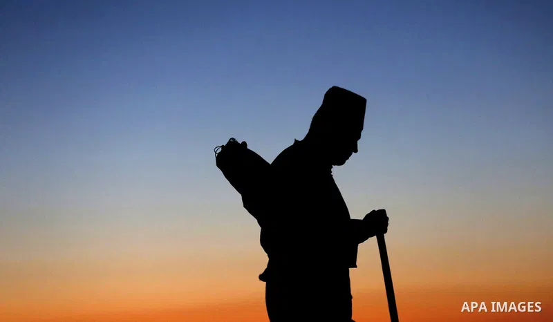 Samaritans gather to pray on top of Mount Gerizim near the northern West Bank city of Nablus as they celebrate the Shavuot festival at dawn, on June 28, 2020. Shavuot marks the giving of the Torah at Mount Sinai seven we...