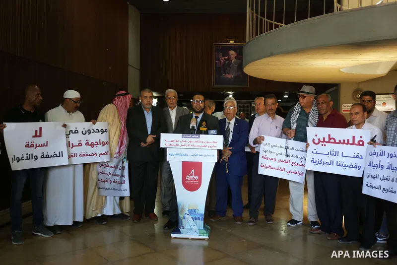 Palestinians take part in a protest against Israel's plan to annex parts of the occupied territory and against US President Donald Trump's Century Deal "expected peace plan", in Gaza city, on June 29, 2020. Photo by Ashr...